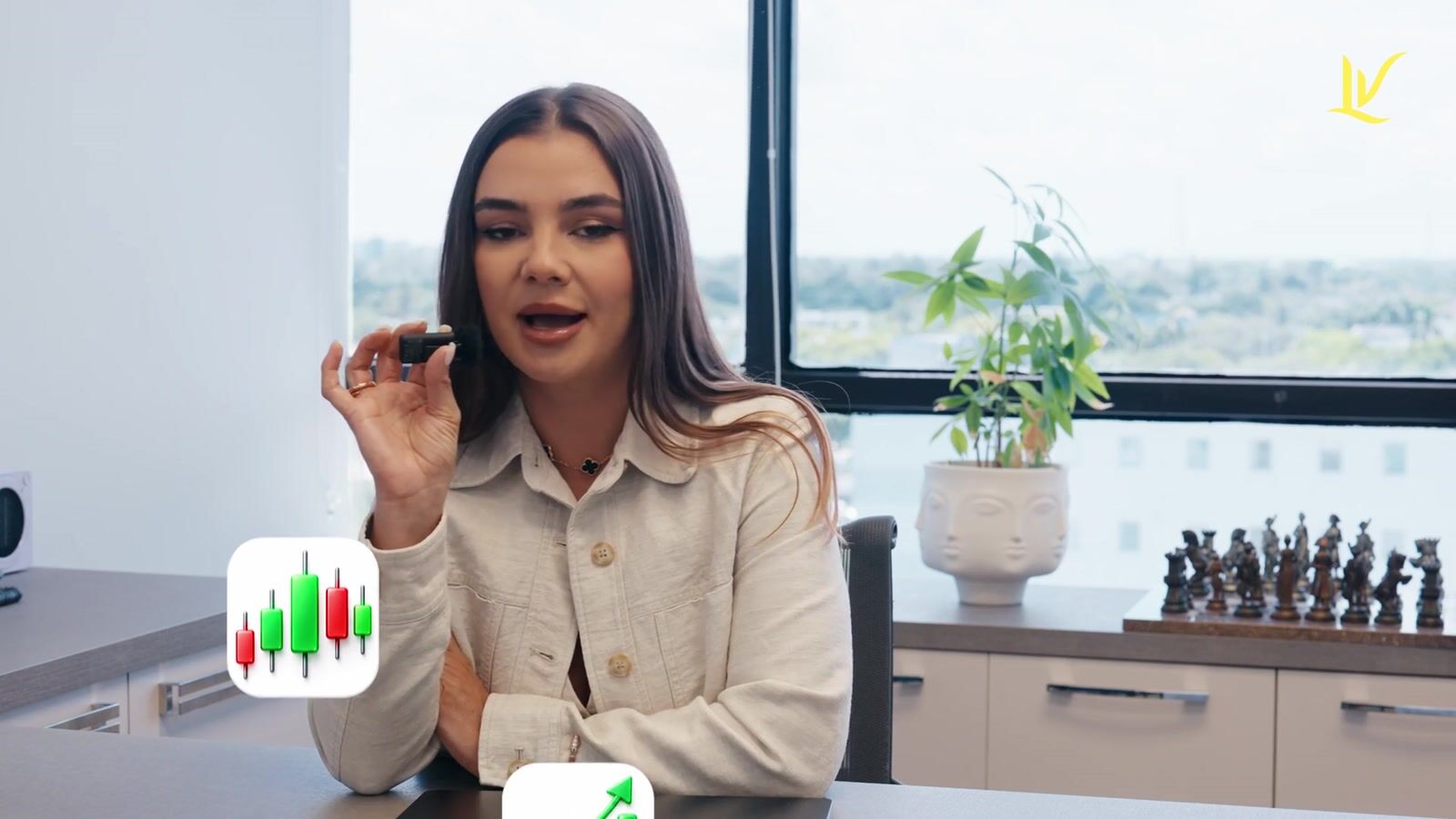 LV on camera, telling the story of how she started trading.